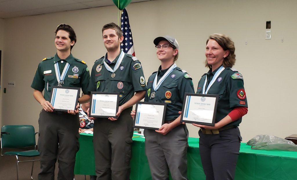 3 Venturers and an adult volunteer receive the Venturing Leadership Award from Garden State Council Venturing in 2018